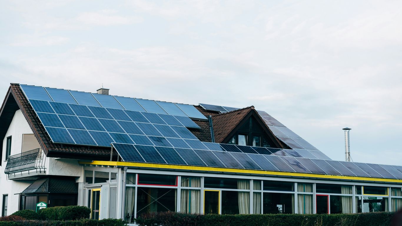a house with solar panels on the roof
