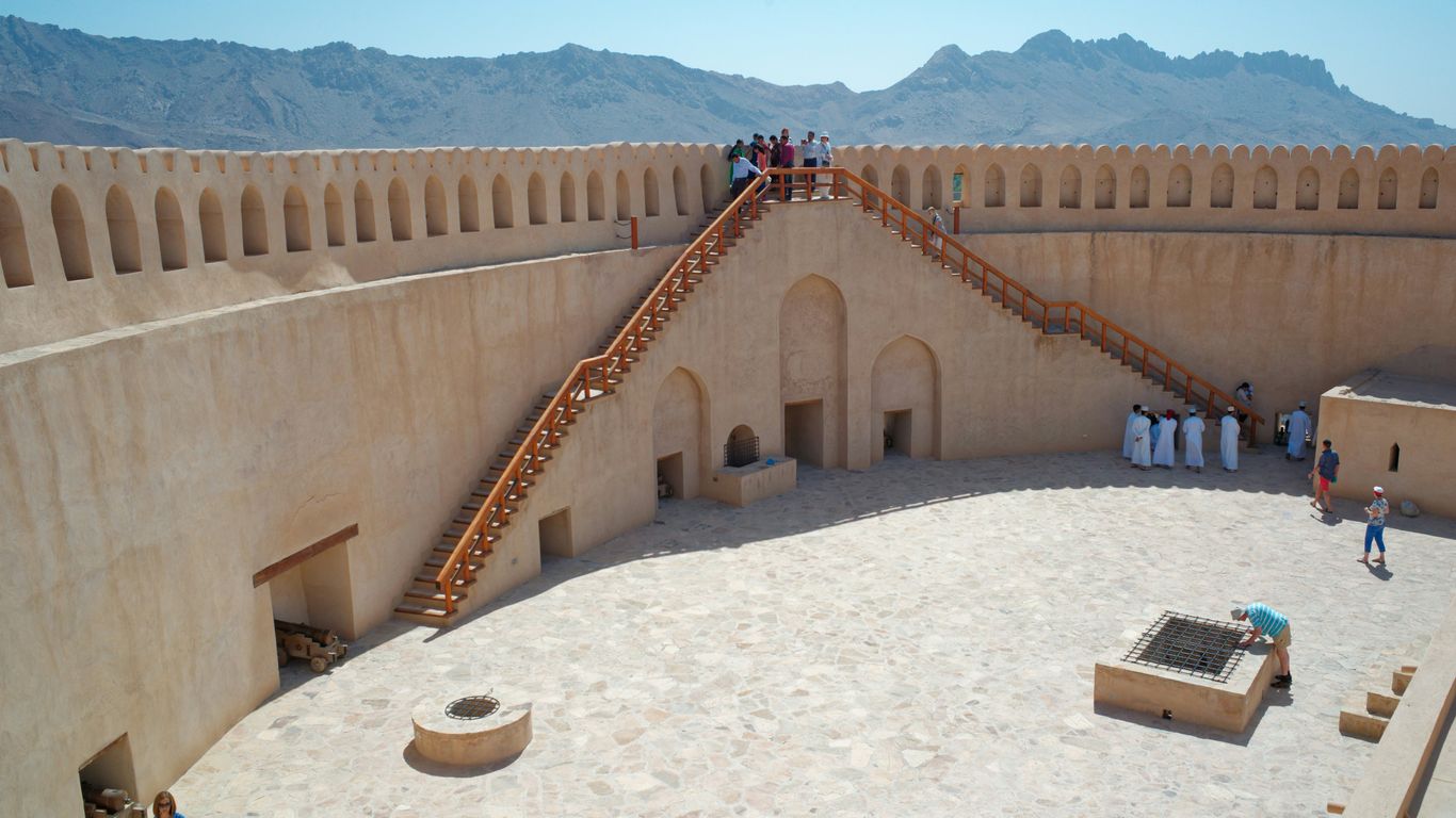 a large circular structure with people standing on it