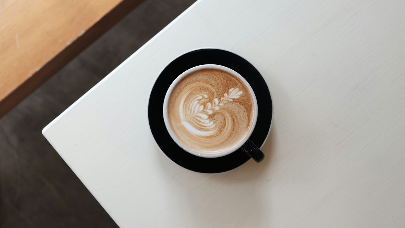 coffee in cup on white surface