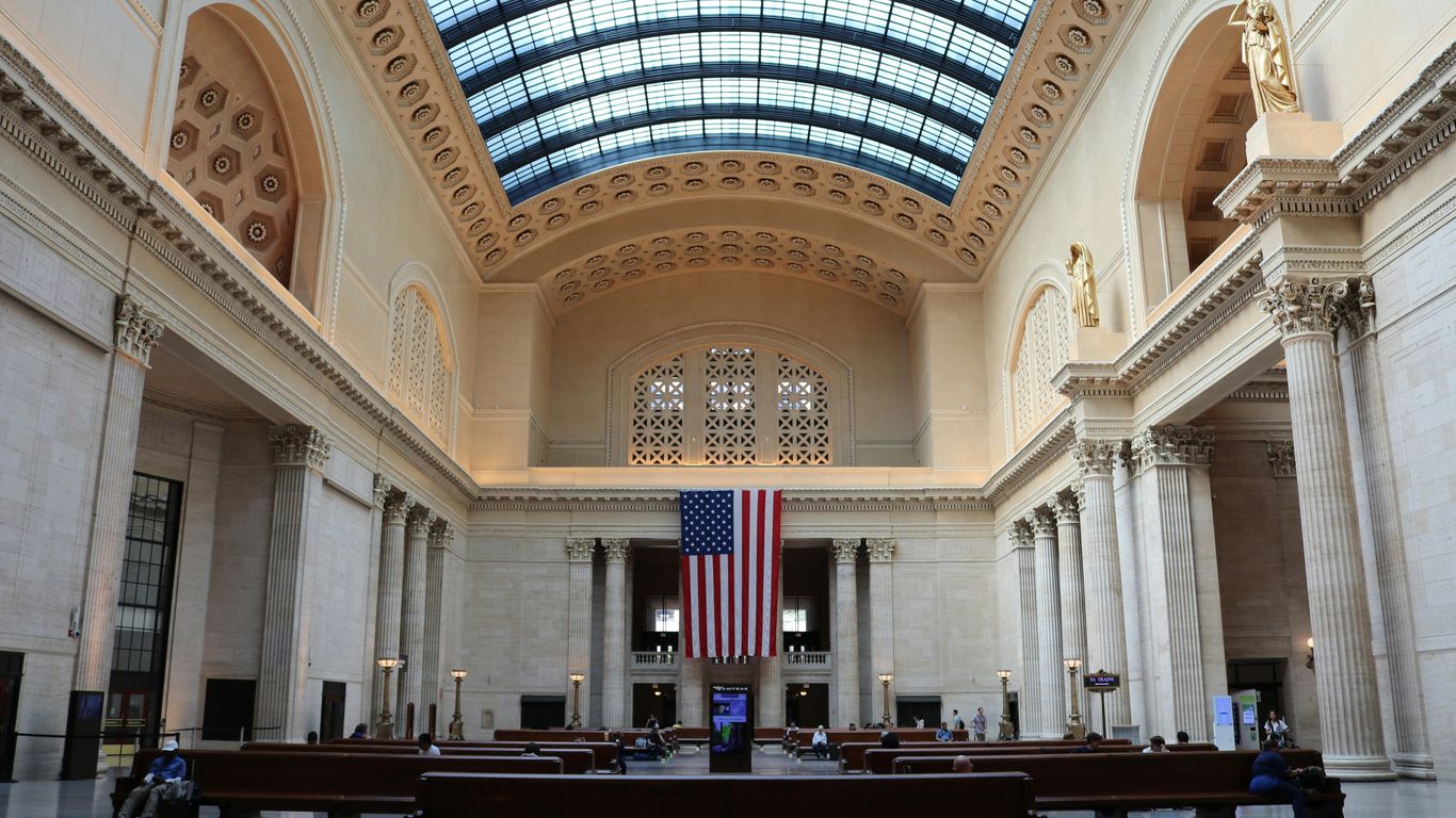 a large church with a flag