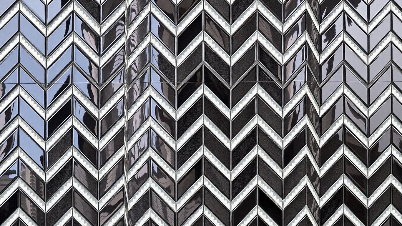 Chevron mosaic tiles on a feature wall.