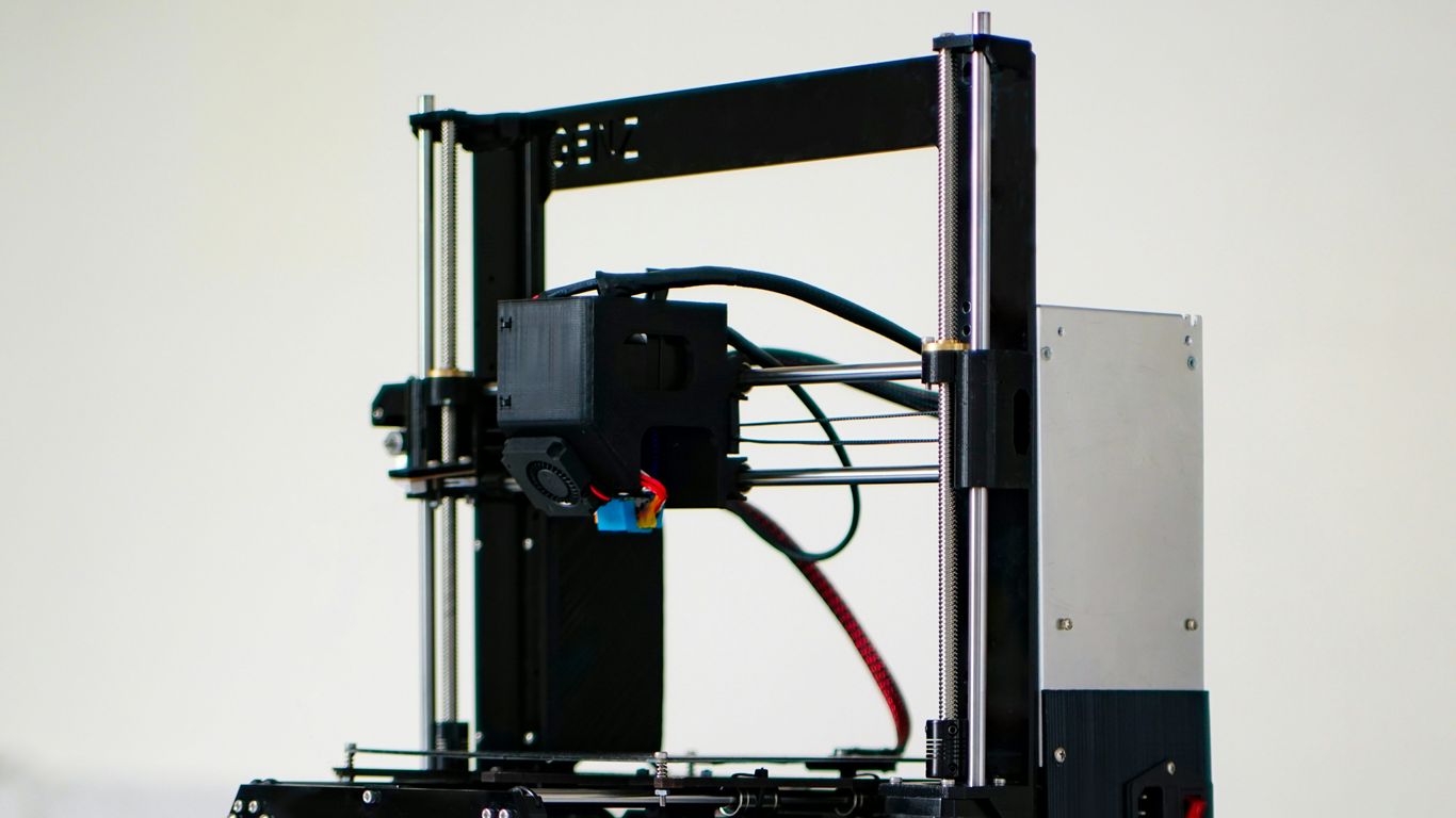 a 3d printer with wires attached to it