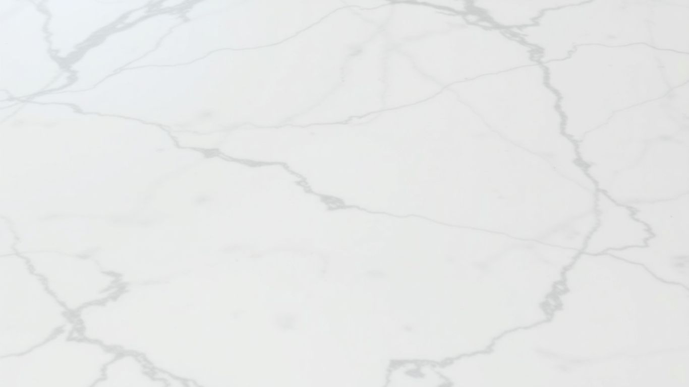 White quartz countertop with subtle grey marble-like veining.