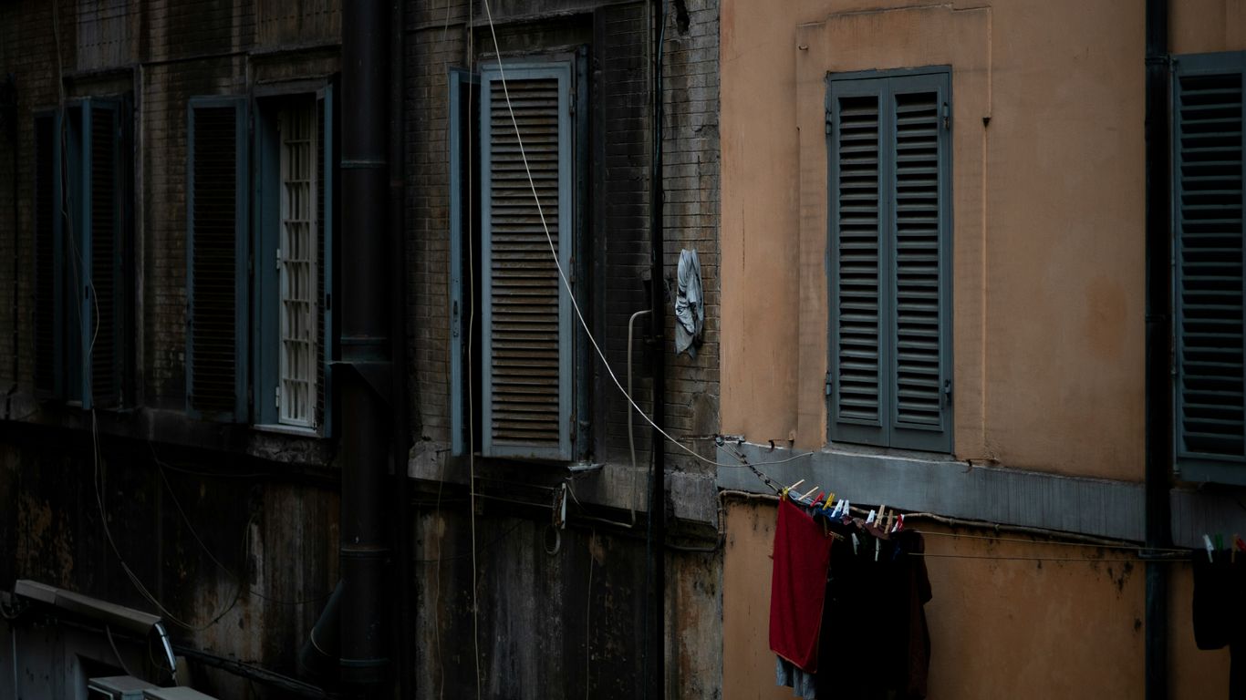 A building that has a bunch of windows on it