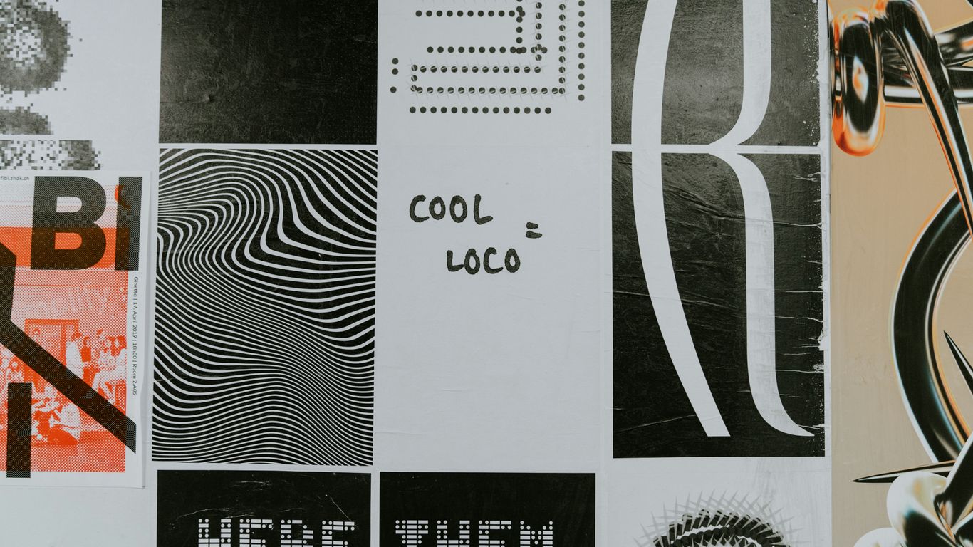 a close up of a wall with many different designs on it