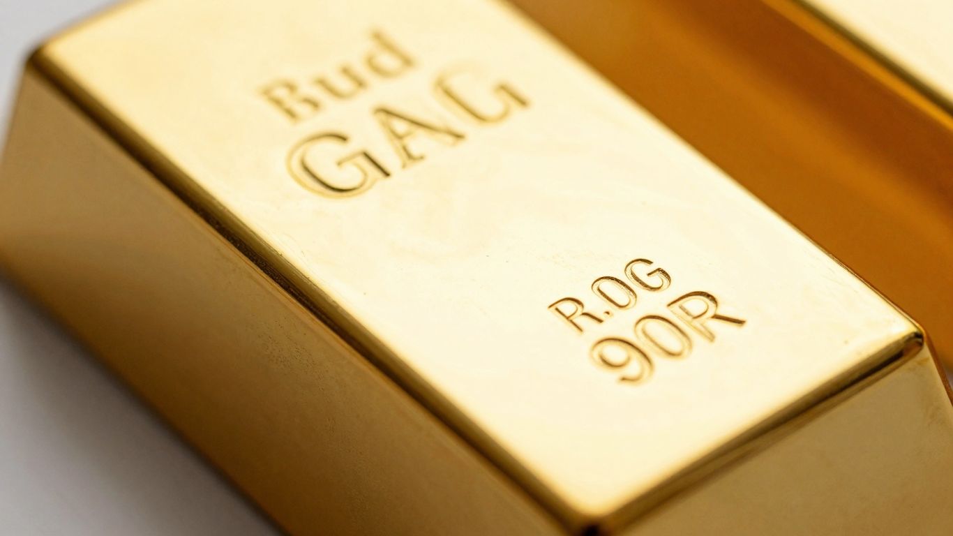 A pure gold ingot shining brightly in the light.