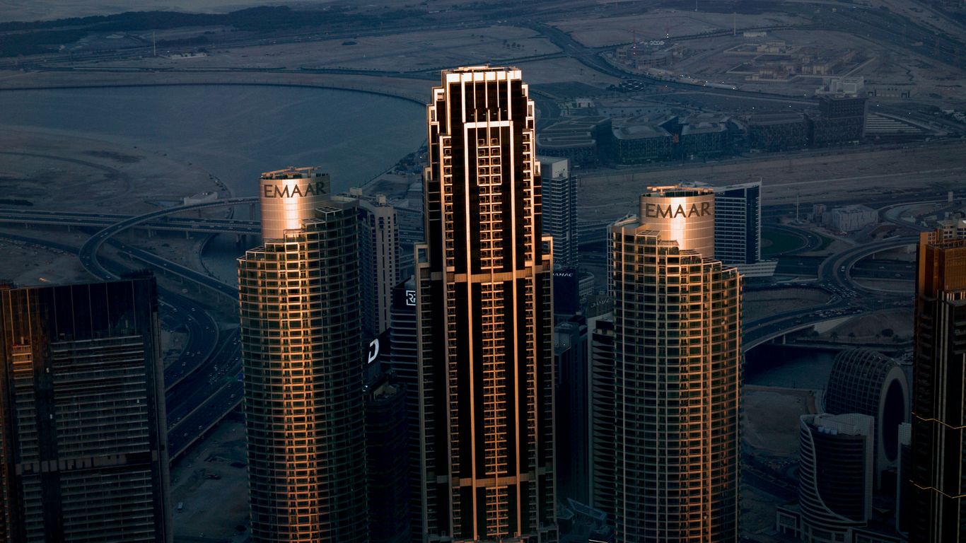 A view of some very tall buildings in a city