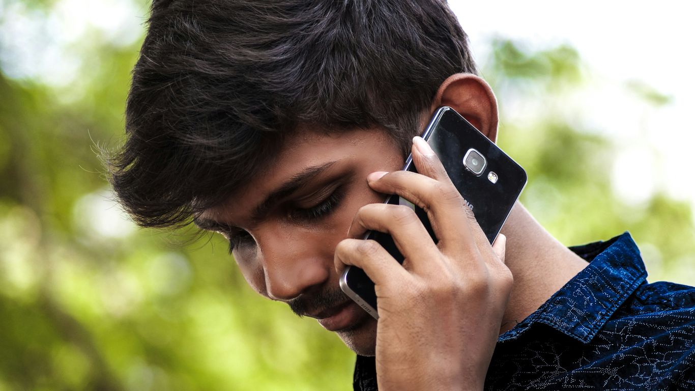 man using smartphone