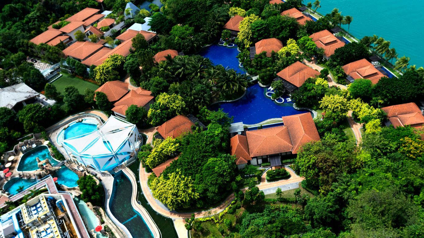 orange roofed houses and a pool