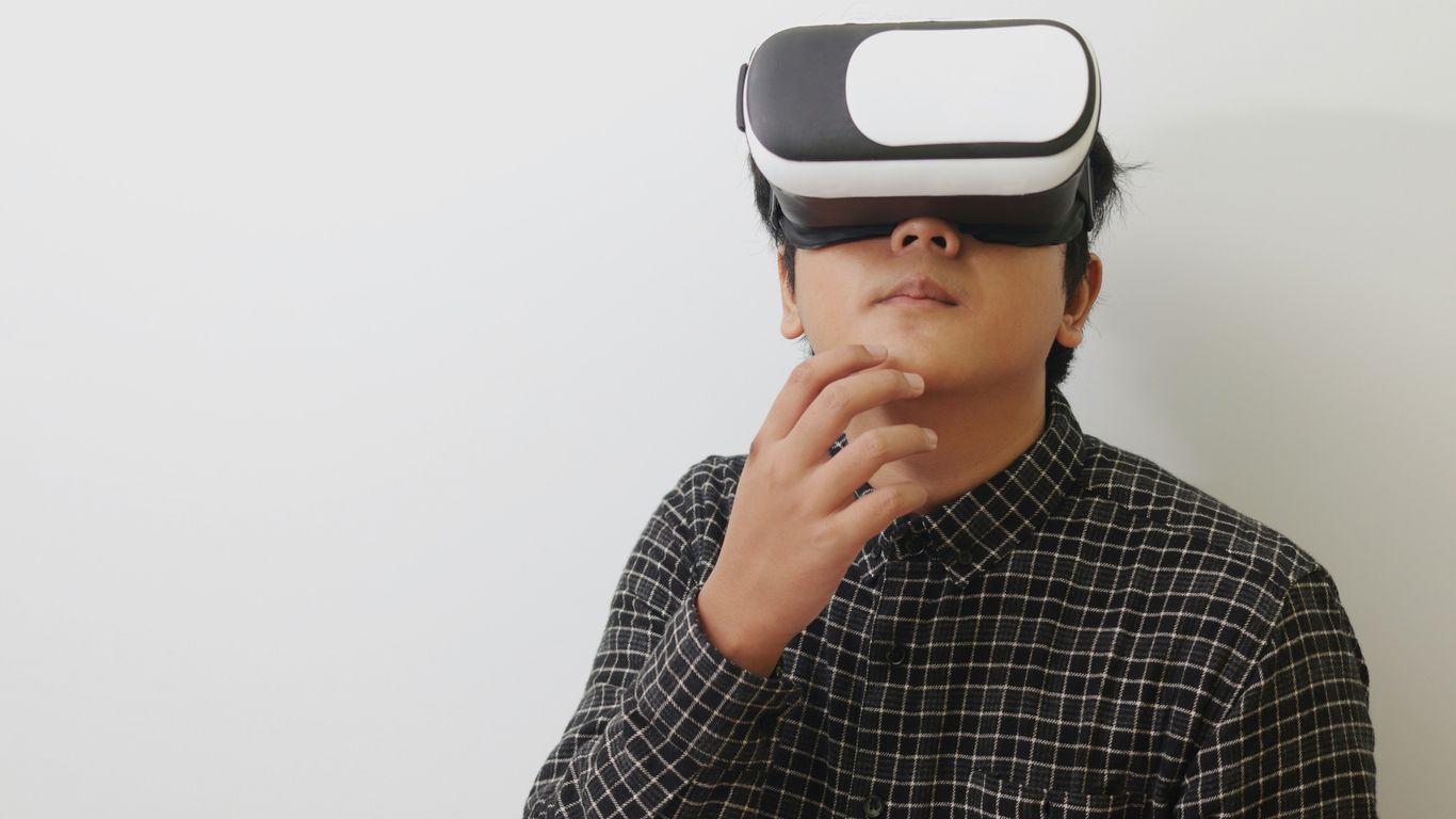 a man wearing a virtual reality headset