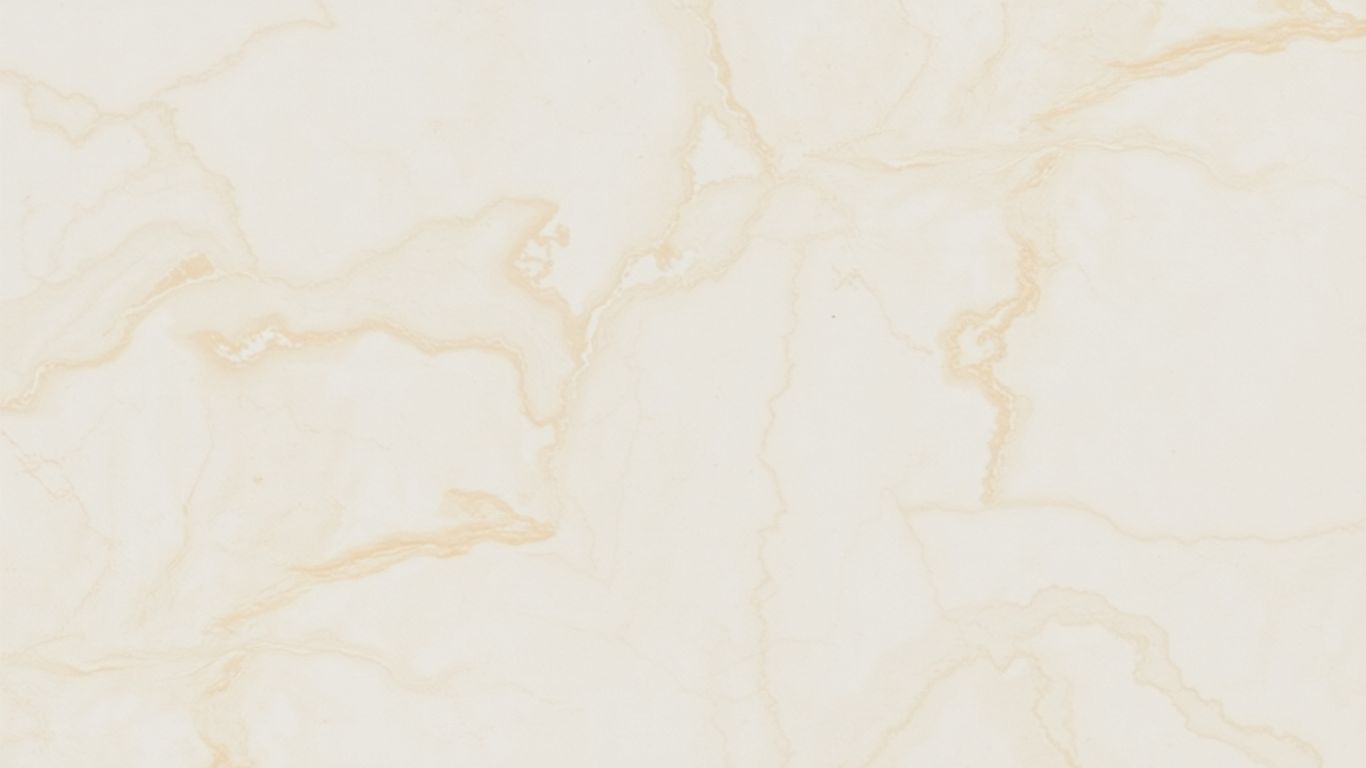 Polished Crema Marfil marble with warm beige tones and veining.