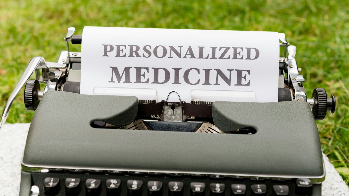 a typewriter with a paper that reads personalized medicine