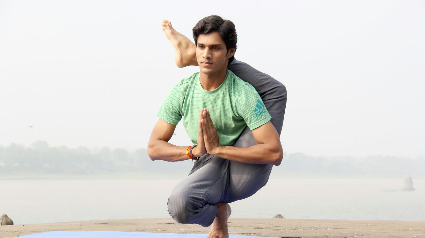 man doing yoga