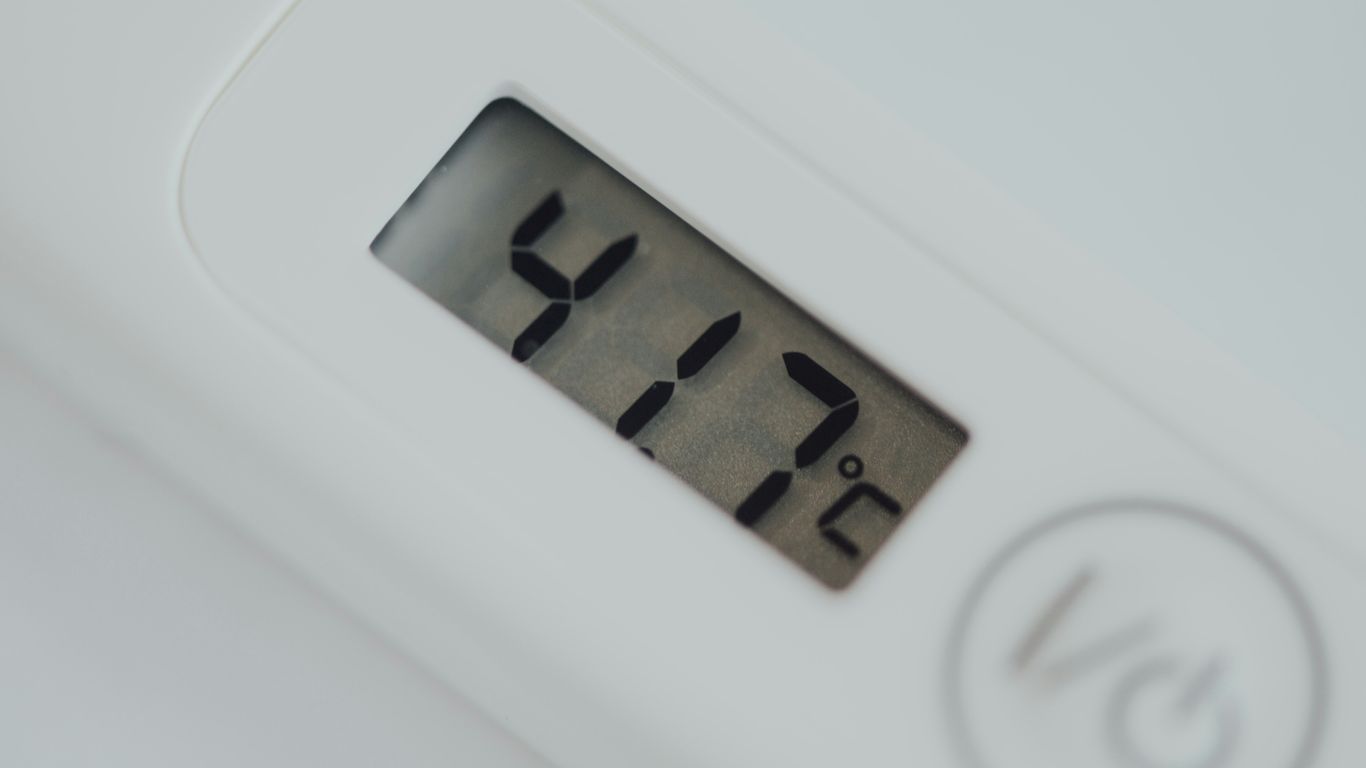 white digital device at 21 0