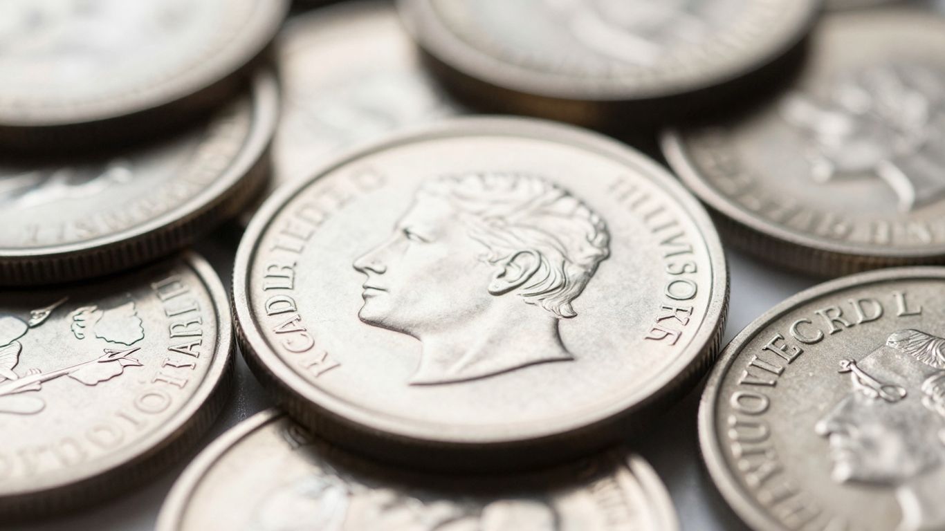 Palladium coins with a metallic sheen.