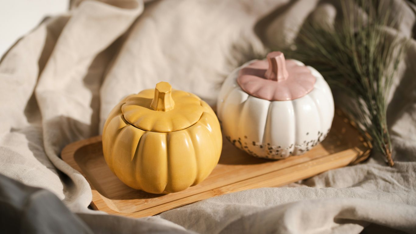 Small pumpkins styled on a wooden tray