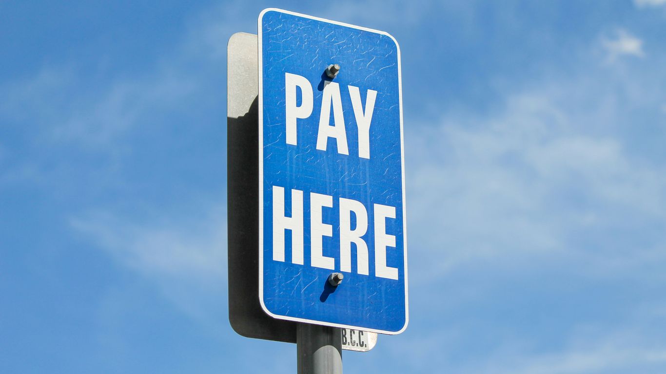 a blue sign with white text