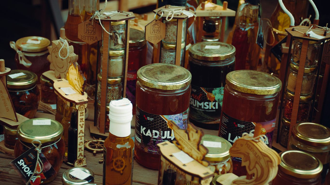 a group of jars with lids