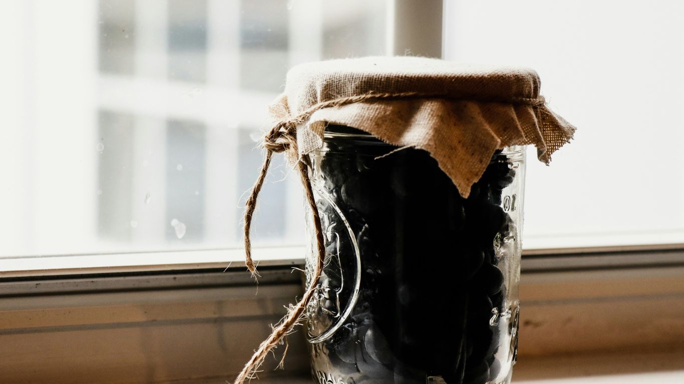 jar of grapes by the window