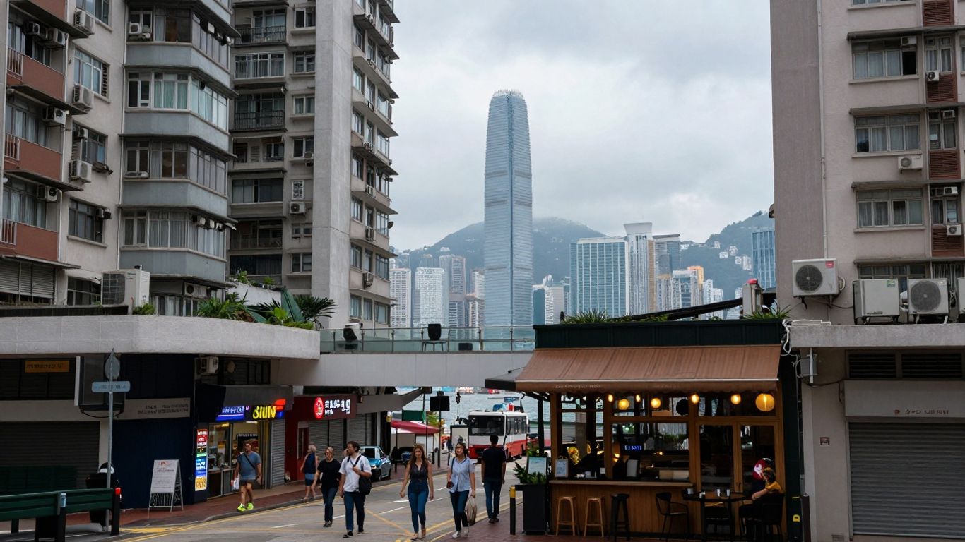 Hong Kong cityscape with apartments and street life.