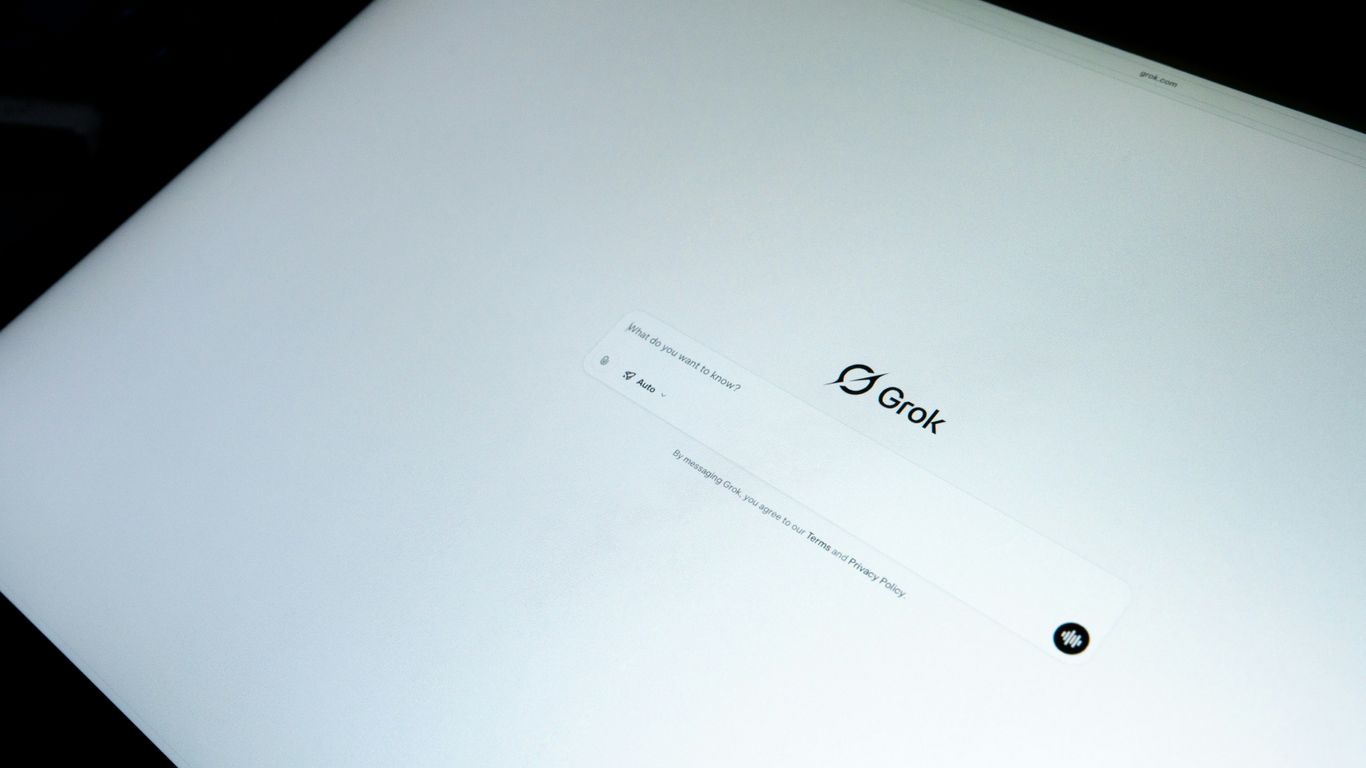 Close-up of a laptop screen with a logo