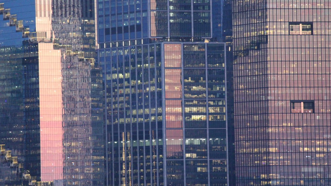 a large group of tall buildings in a city