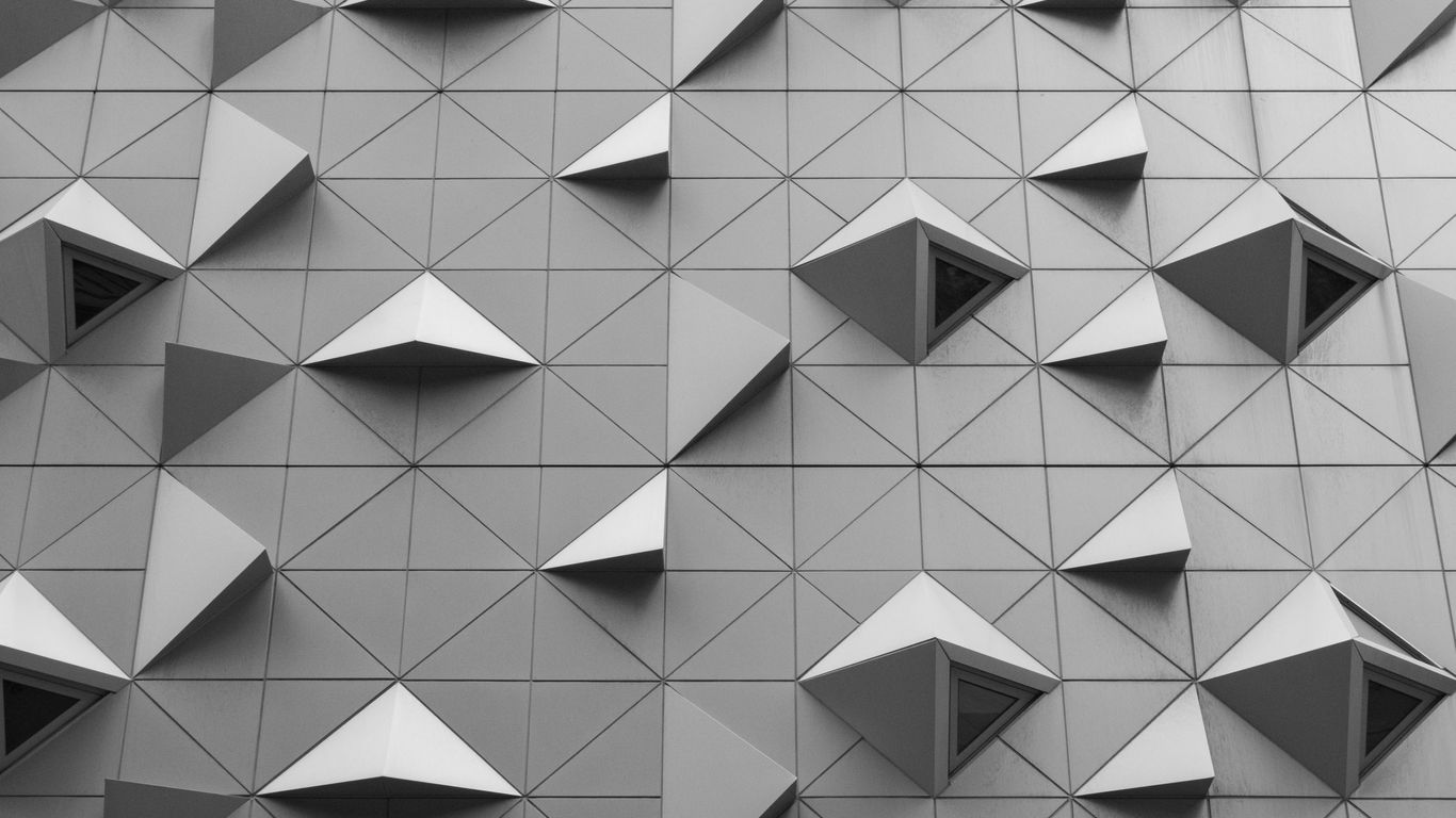 a building that has a bunch of cubes on it