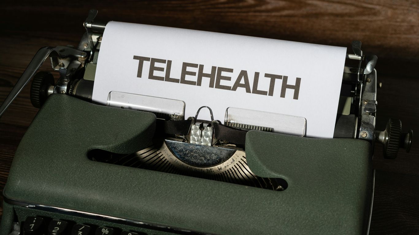a close up of a typewriter with a paper on it