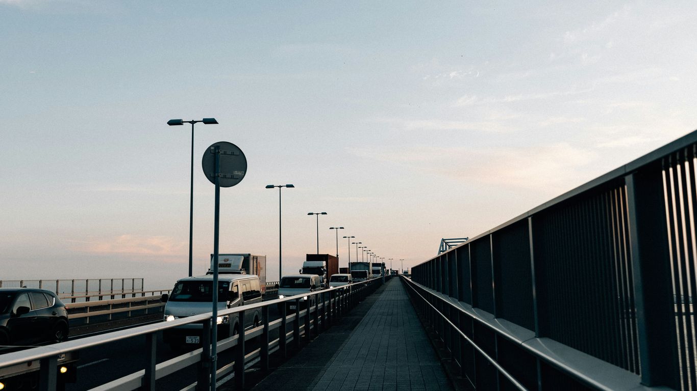 Traffic on a bridge during the day