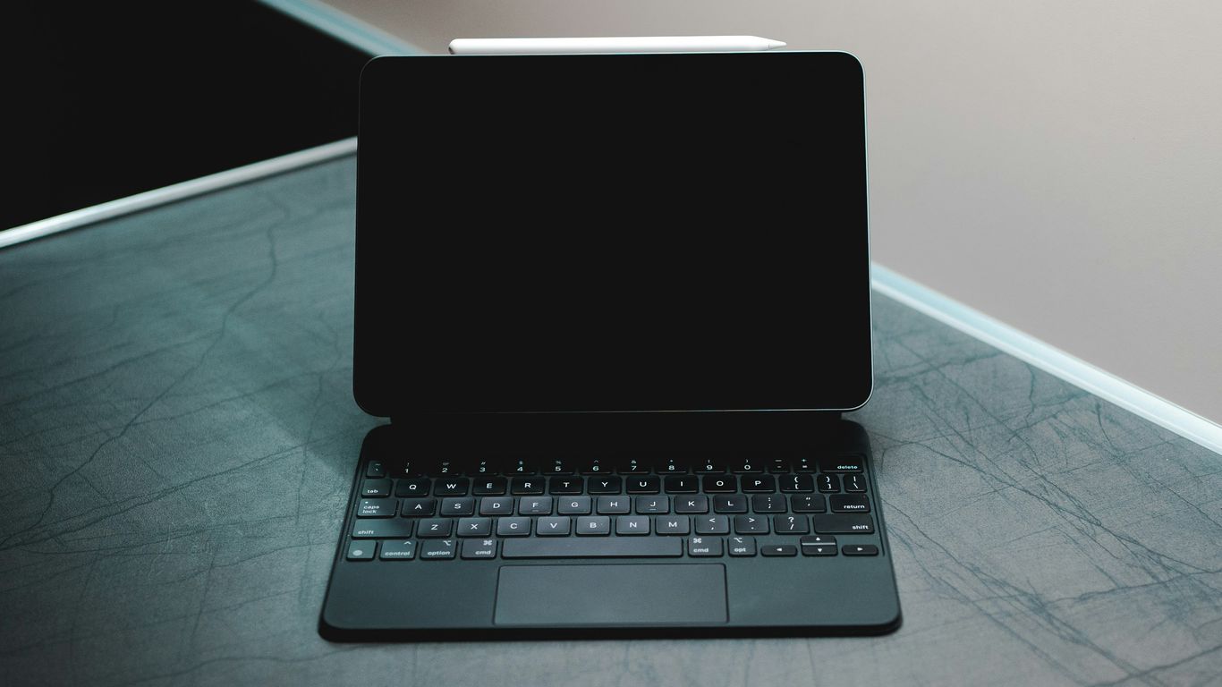 black tablet computer with keyboard