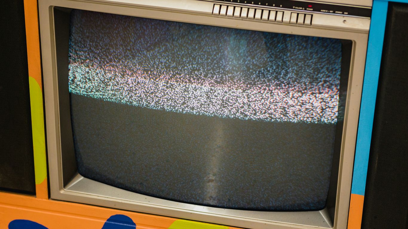 an old television sitting on top of a table