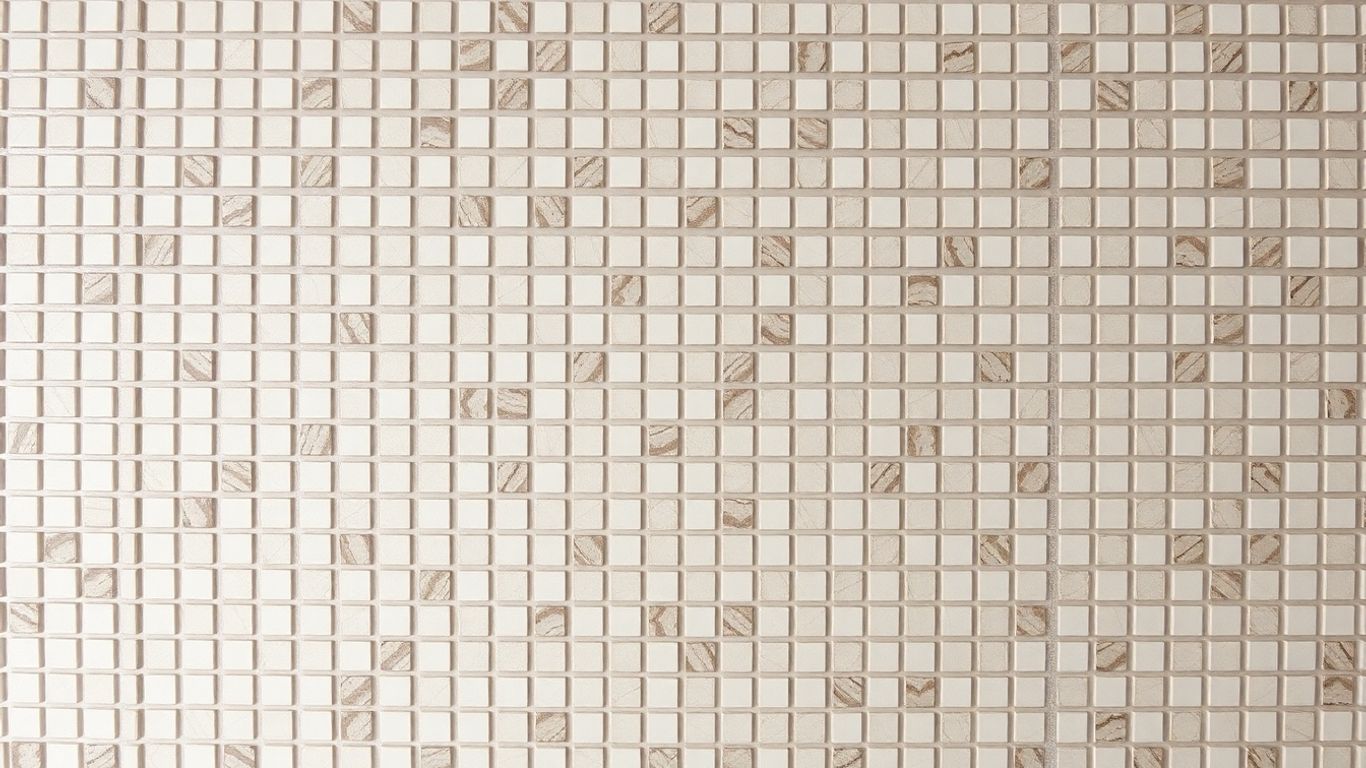 Close-up of a 2x2 mosaic tile on a wall.