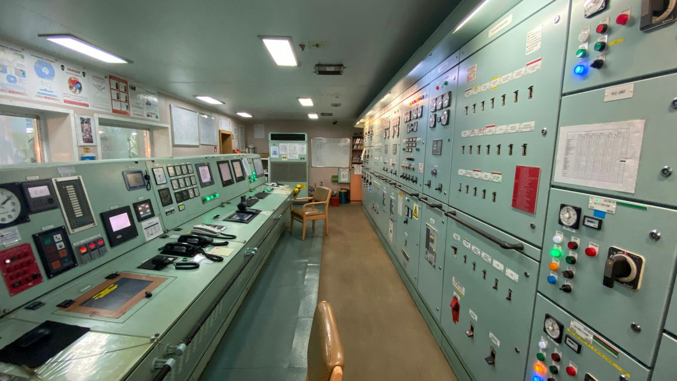 a control room filled with lots of electronic equipment