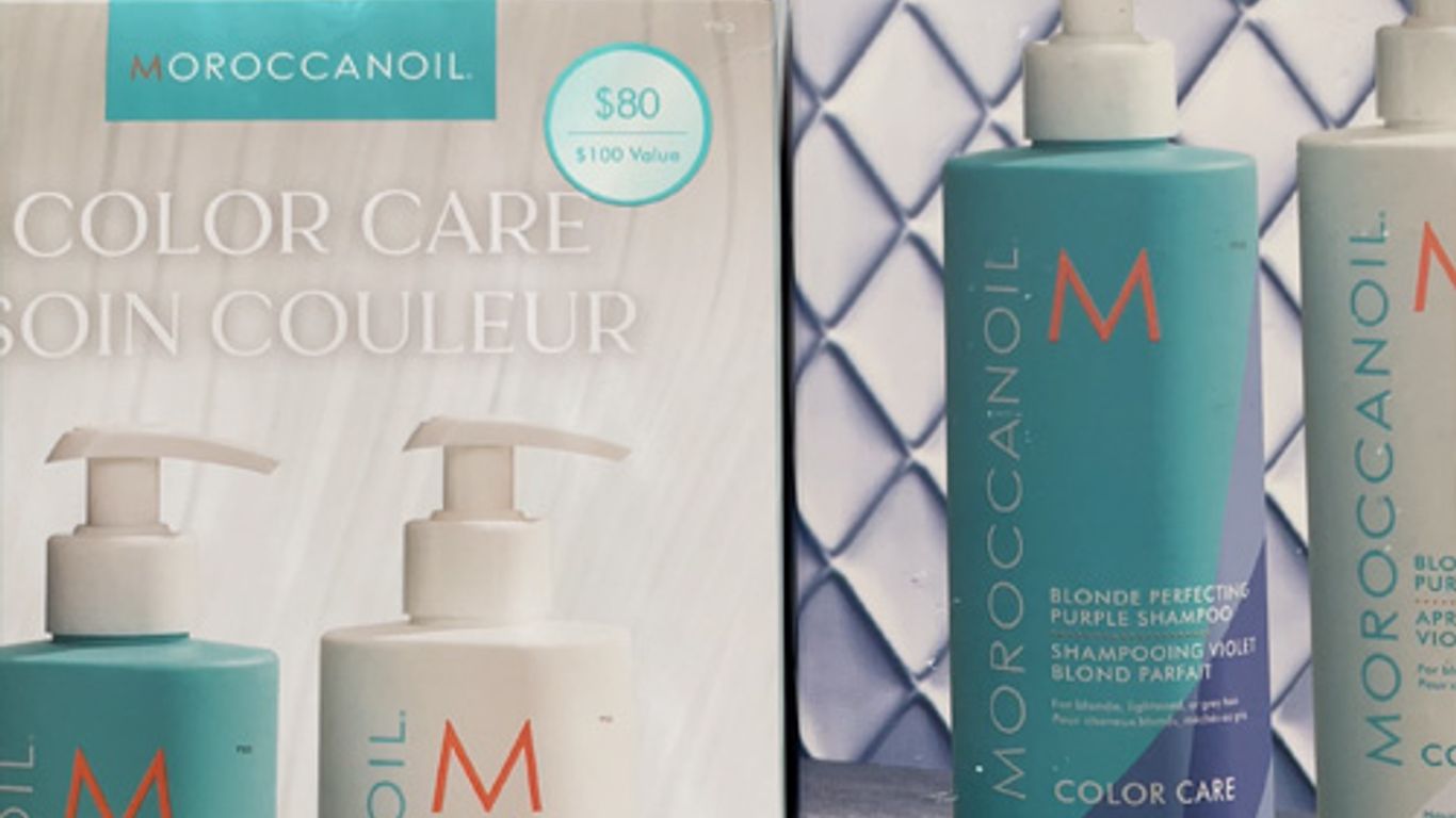 Haircare products from Moroccanoil displayed on a surface.