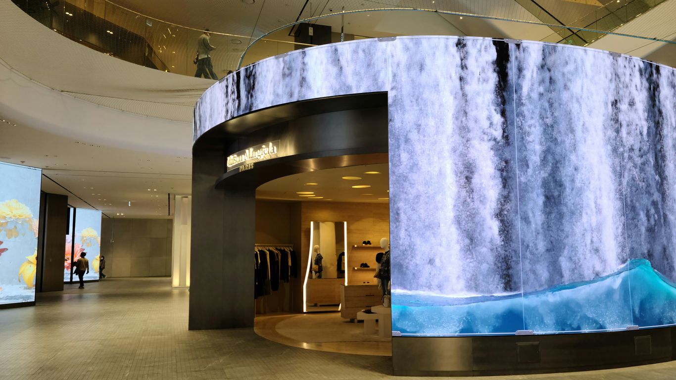 a large display of a waterfall inside of a building