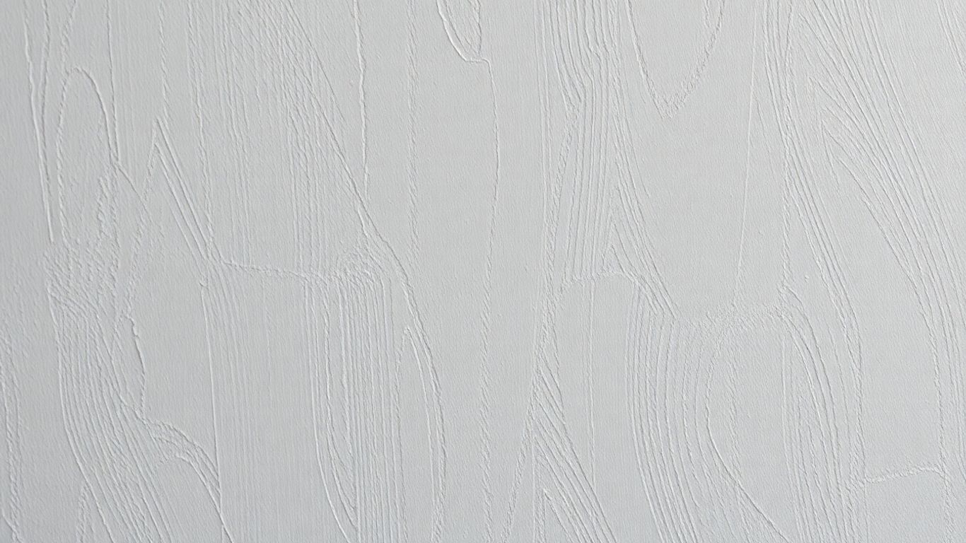 Textured interior wall with unique paint finish.