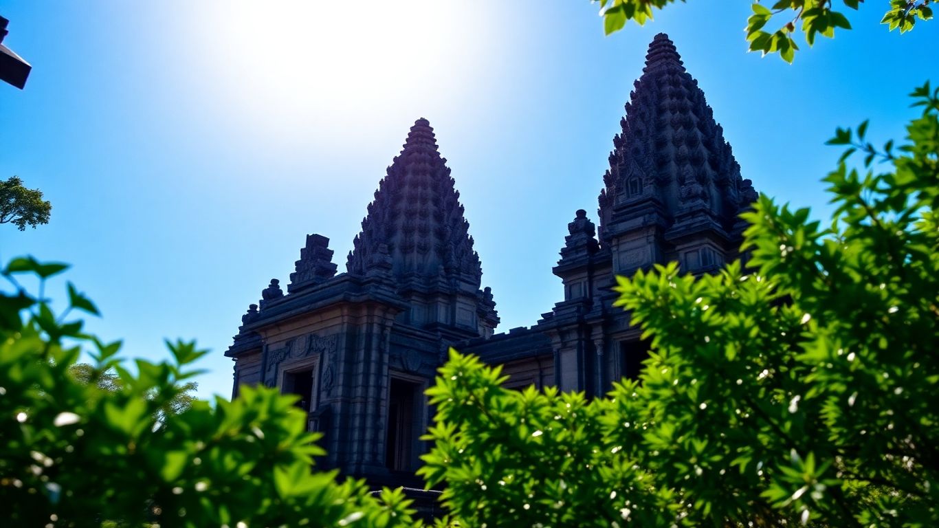 Angkor Wat temple complex in Cambodia under a blue sky.