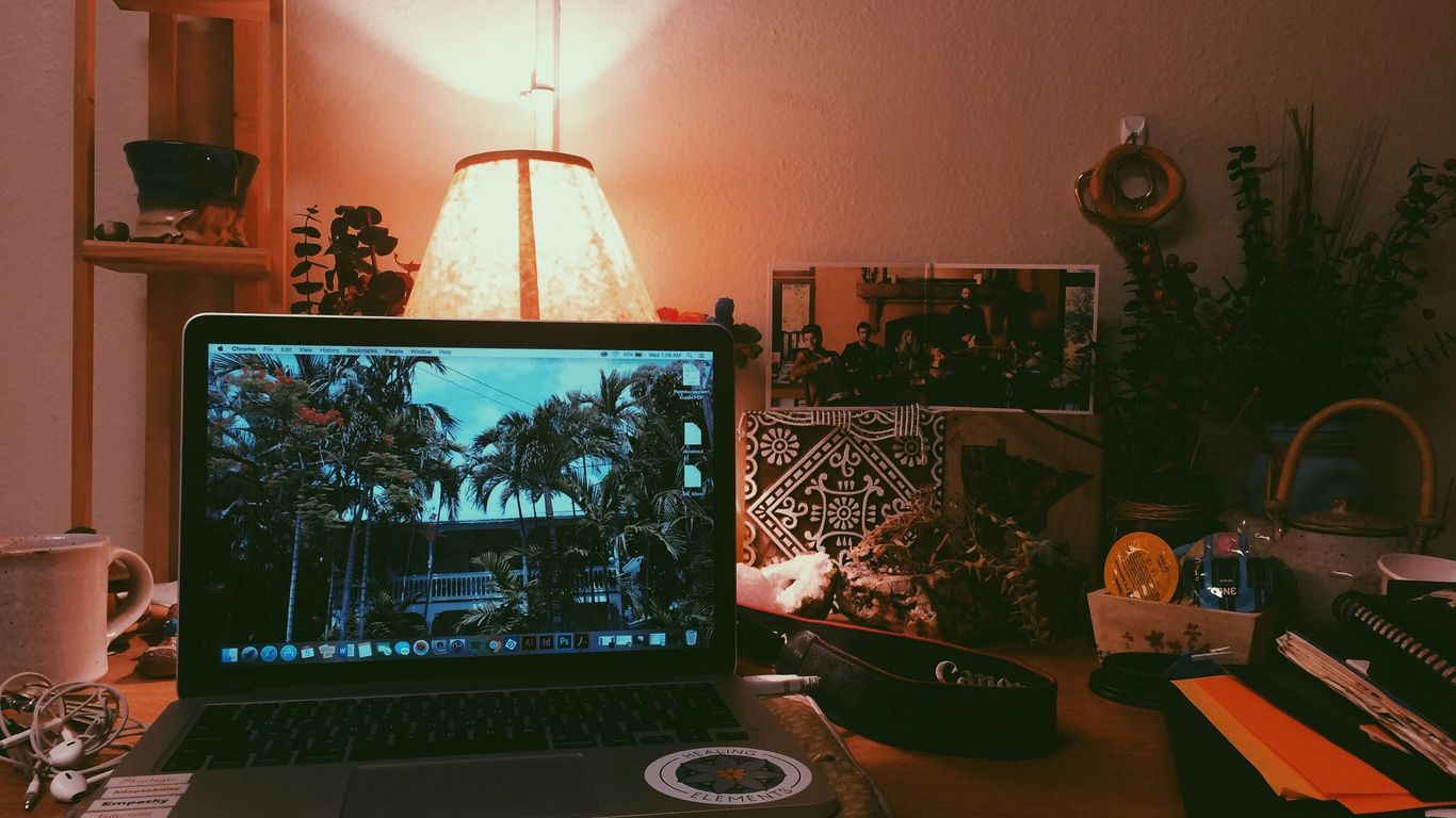 a laptop sits on a table