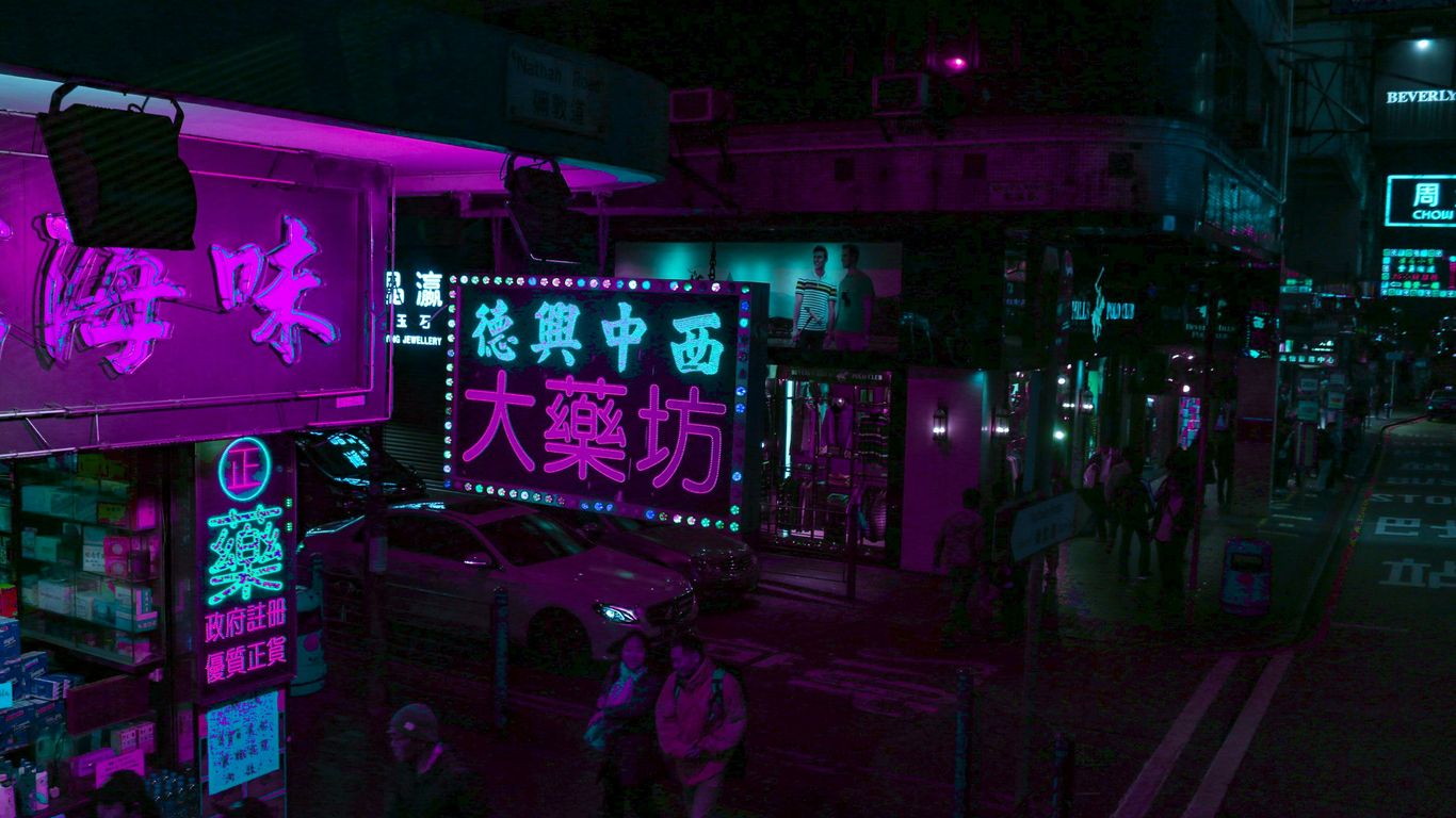 people walking on street during nighttime