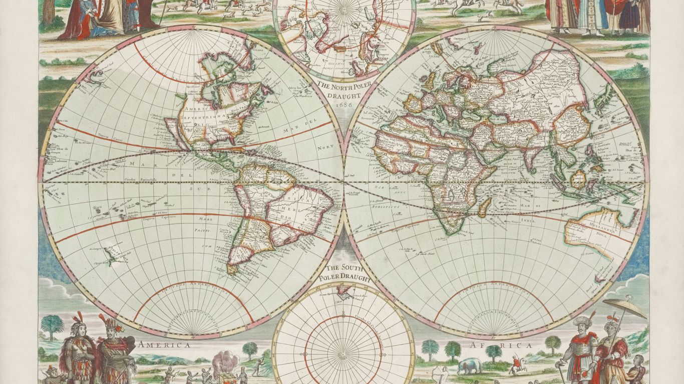 diverse group of people looking at a world map