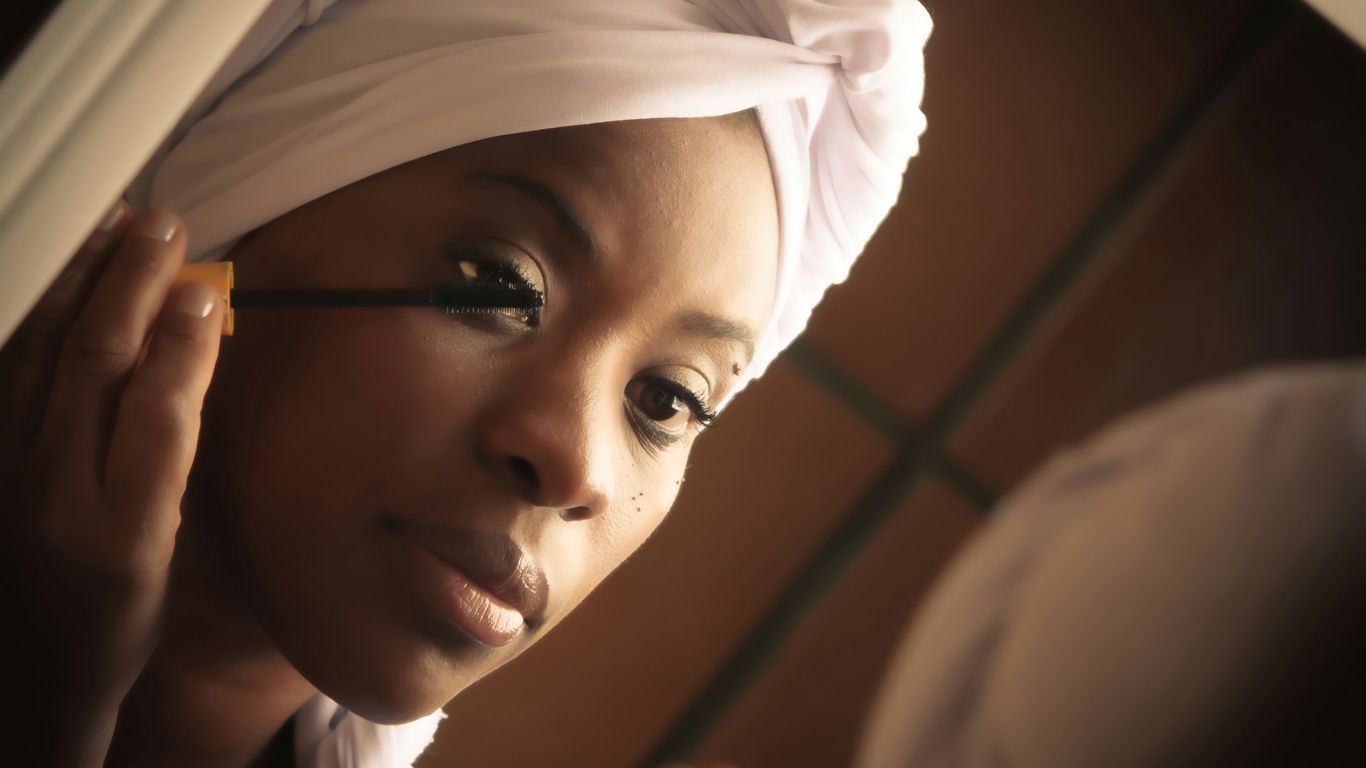 woman in white hijab smiling