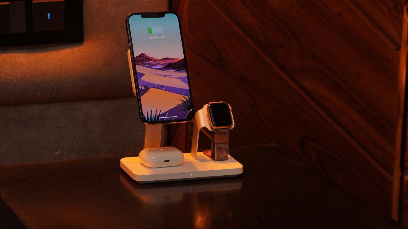 a cell phone and a charger on a table