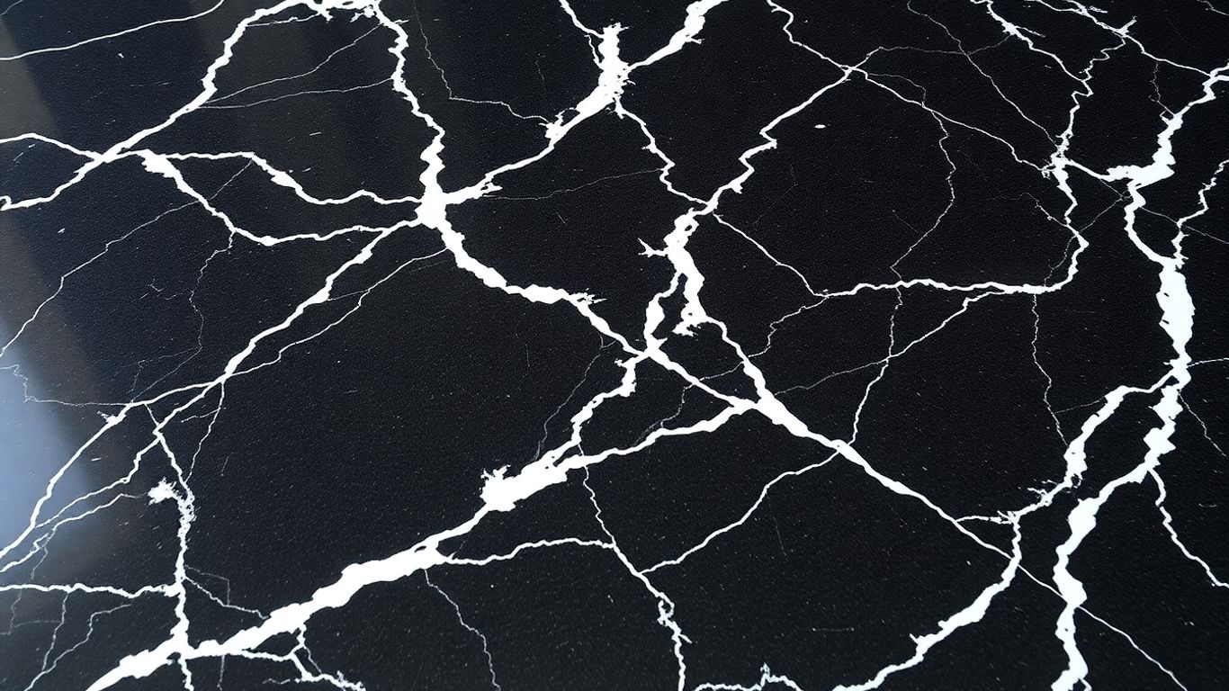 Polished Nero Marquina marble floor with white veins.