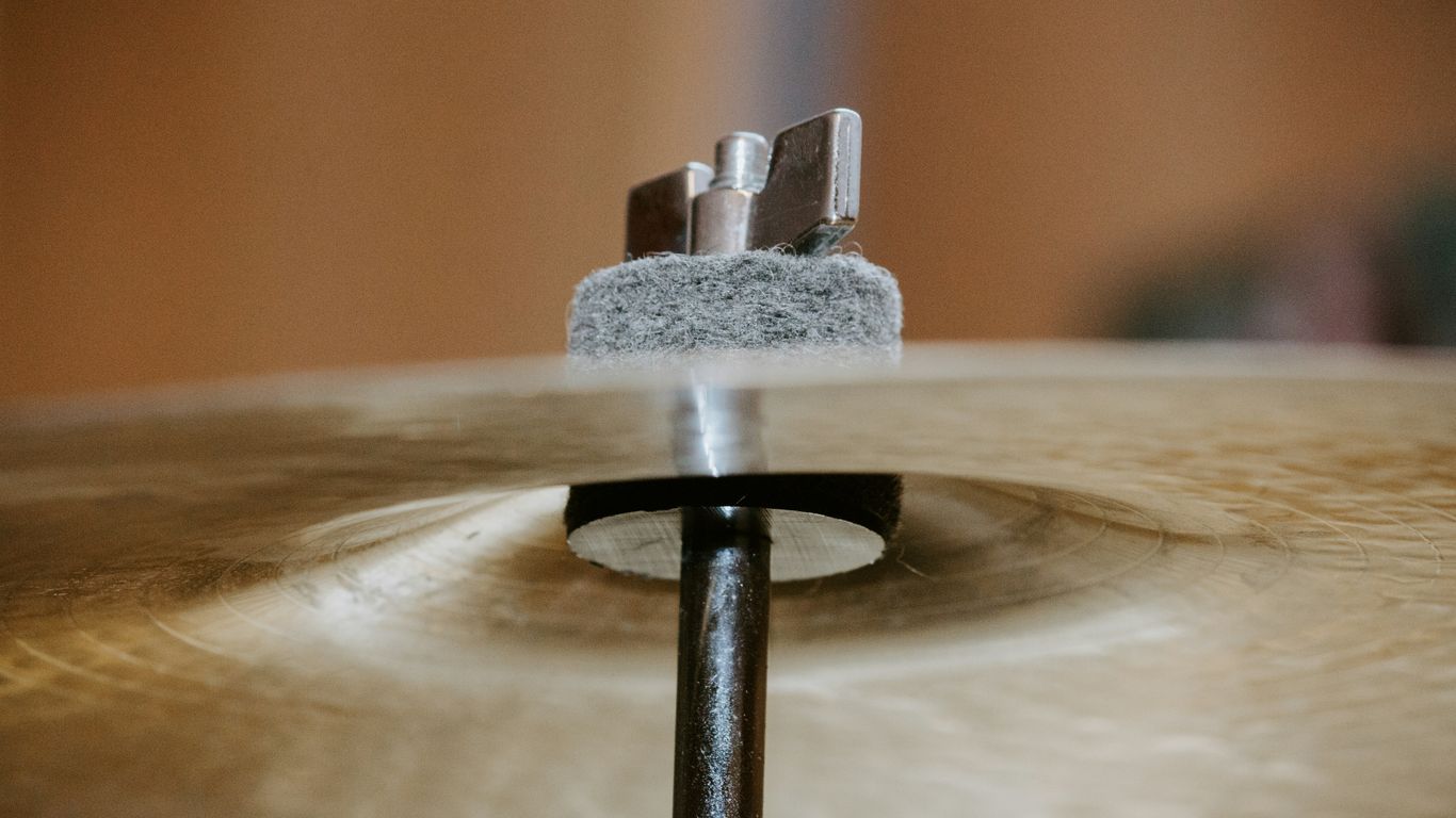 gray metal cymbals holder