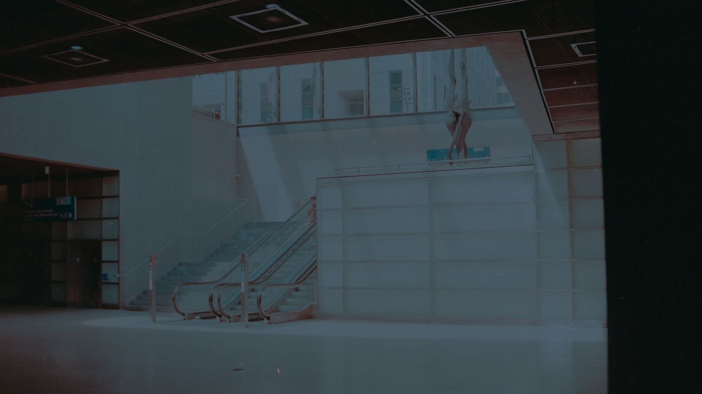 Modern building interior with stairs and glass walls