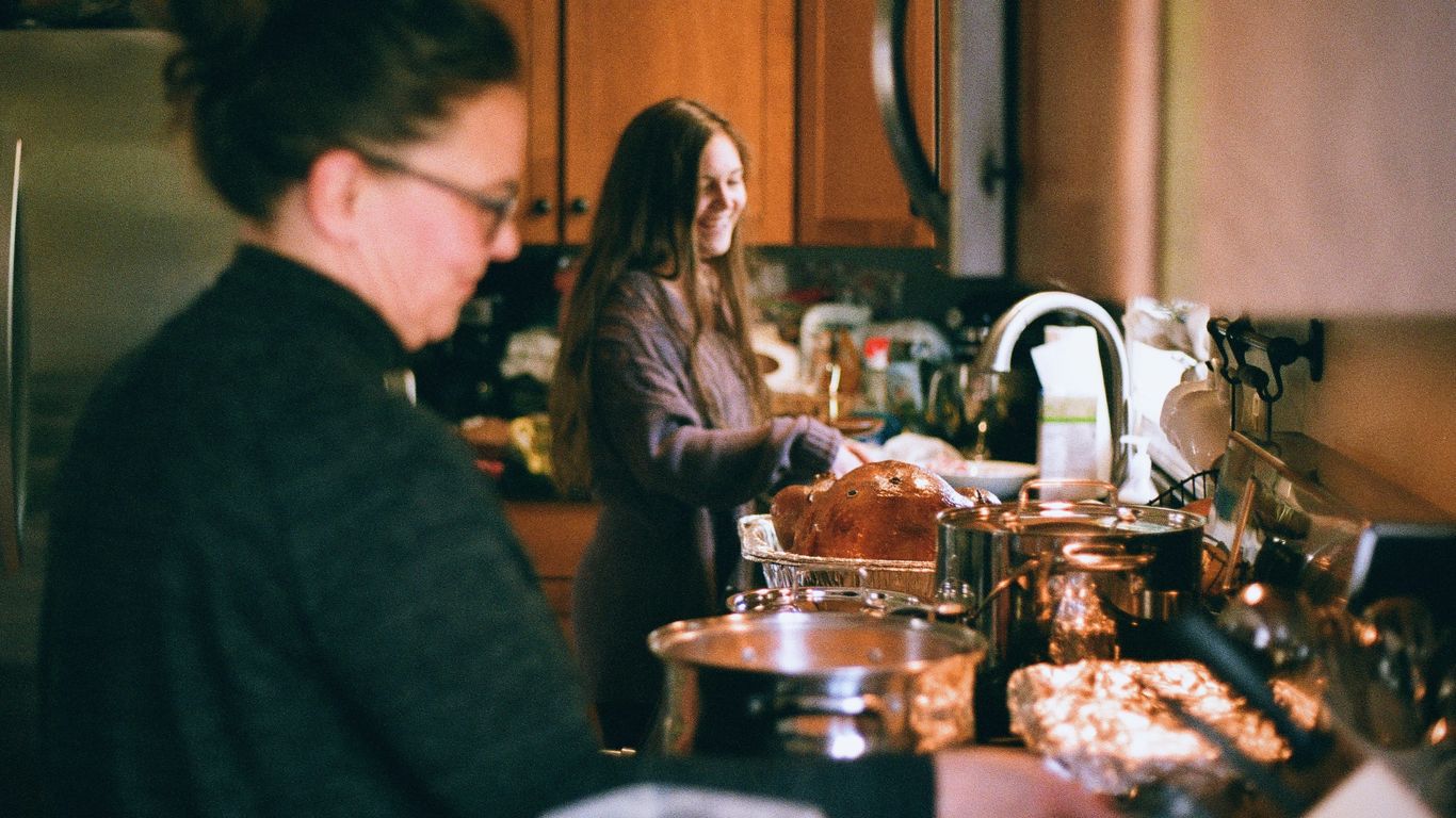 man and woman sitting at table
