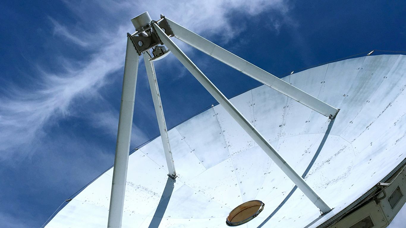 a white structure with a blue sky