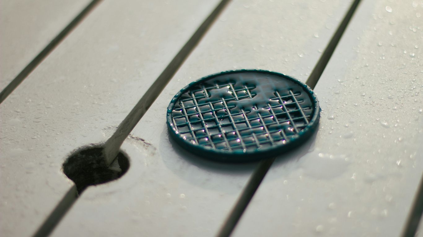 a blue plate sitting on top of a wooden table