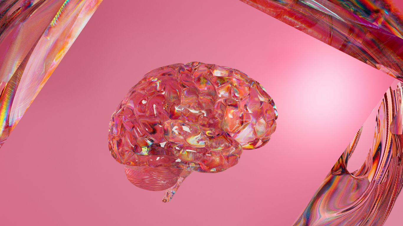 A close up of a pink object on a pink background