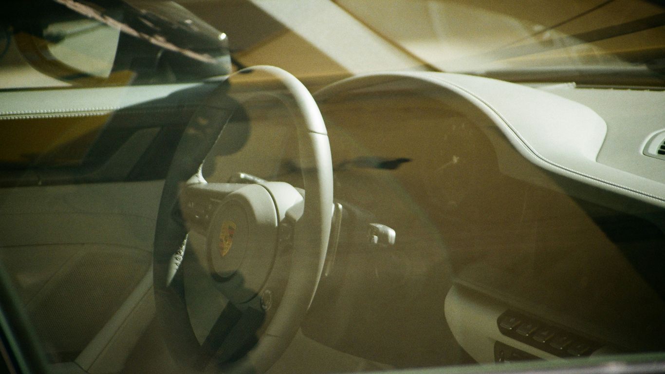 the interior of a car with a steering wheel
